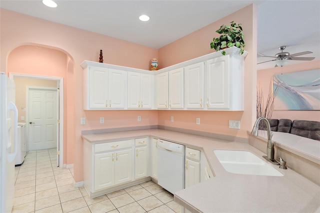 kitchen featuring white cabinets, dishwasher, ceiling fan, and sink