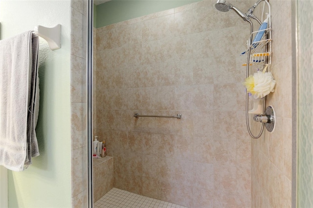 bathroom with tiled shower