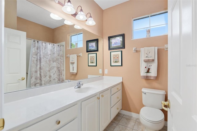 bathroom featuring tile patterned flooring, vanity, toilet, and a shower with curtain