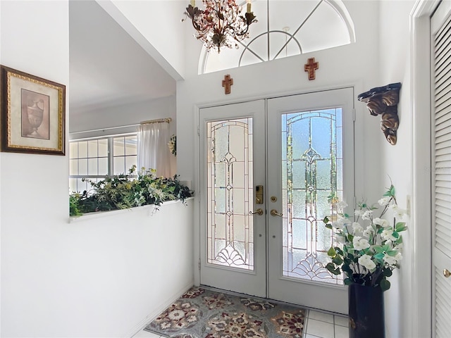 tiled entrance foyer with french doors