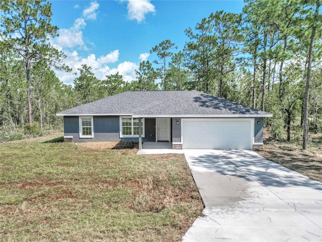 ranch-style home with a garage and a front yard