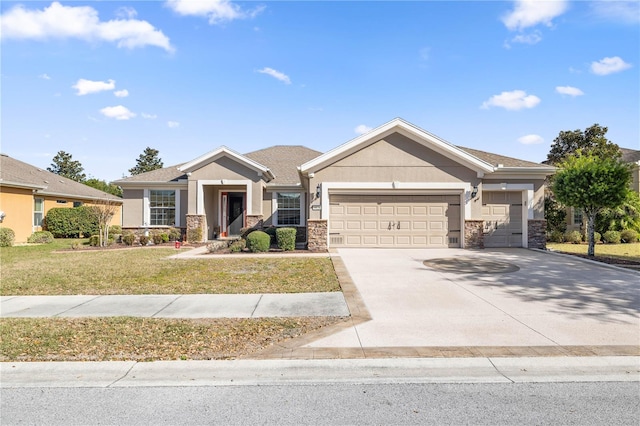 craftsman house featuring a front yard and a garage