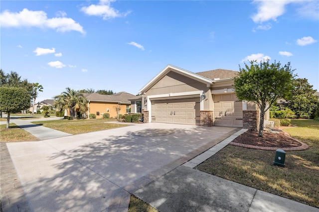 view of front of house with a garage and a front lawn