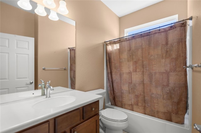 full bathroom featuring shower / bath combo, vanity, and toilet