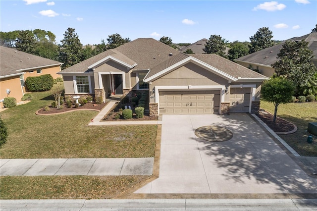 craftsman house featuring a garage and a front yard