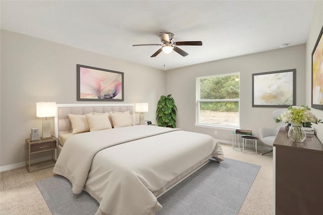 bedroom with light carpet and ceiling fan