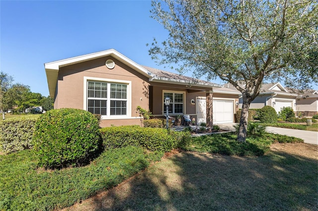 single story home with a garage