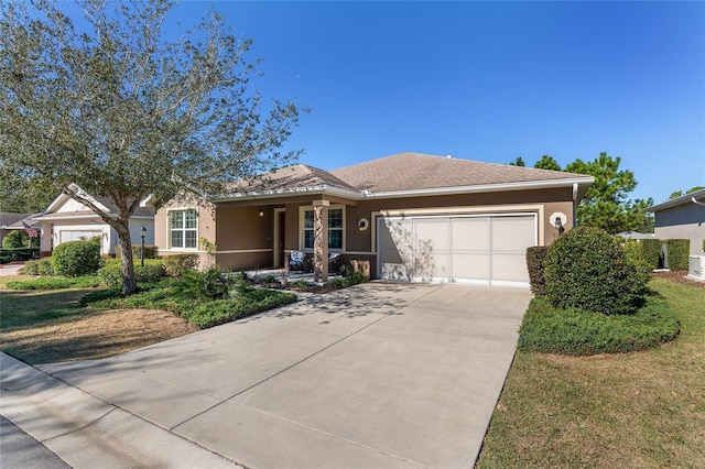 9350 SW 91st Court Rd, Ocala, FL 34481 - ranch-style house featuring a garage, concrete driveway, and stucco siding