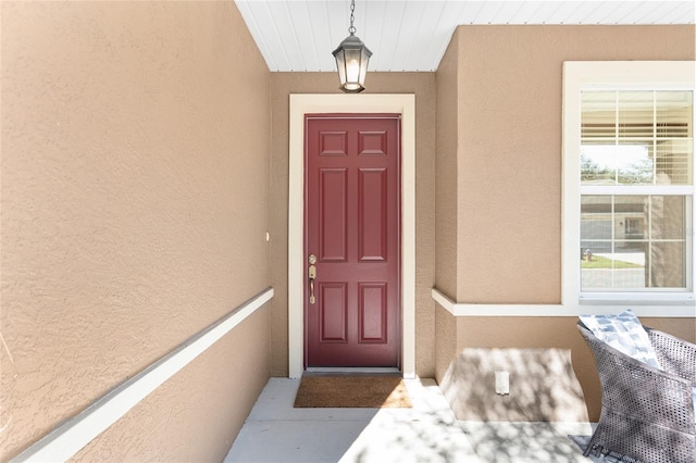 9350 SW 91st Court Rd, Ocala, FL 34481 - view of exterior entry with stucco siding