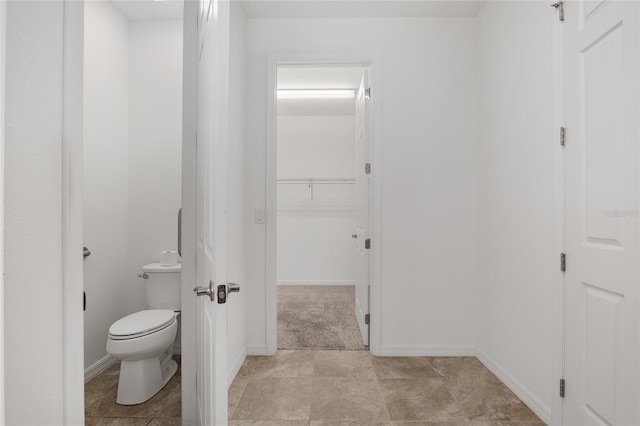 bathroom featuring toilet