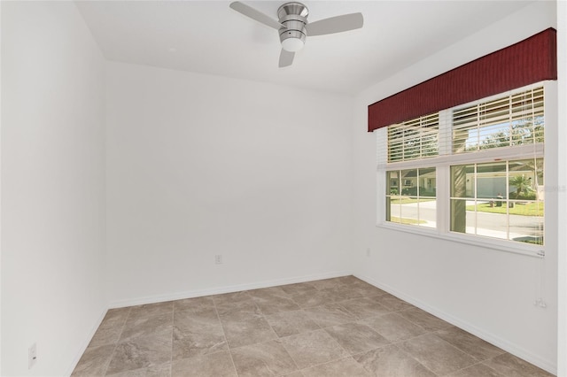 empty room featuring ceiling fan