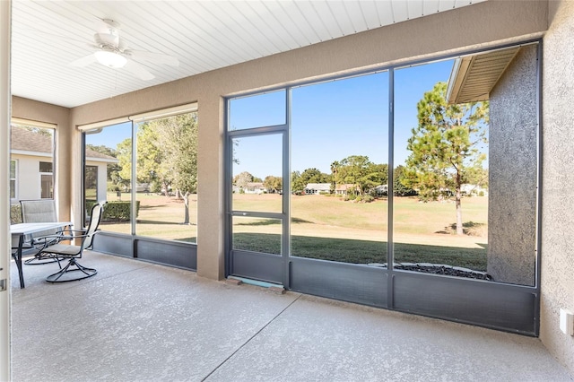 9350 SW 91st Court Rd, Ocala, FL 34481 - unfurnished sunroom with ceiling fan