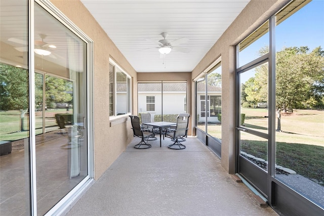 9350 SW 91st Court Rd, Ocala, FL 34481 - sunroom / solarium with ceiling fan and outdoor dining space