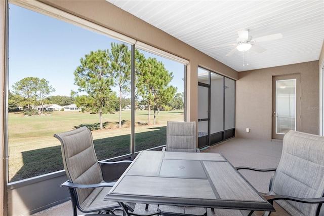 9350 SW 91st Court Rd, Ocala, FL 34481 - sunroom with ceiling fan and outdoor dining space