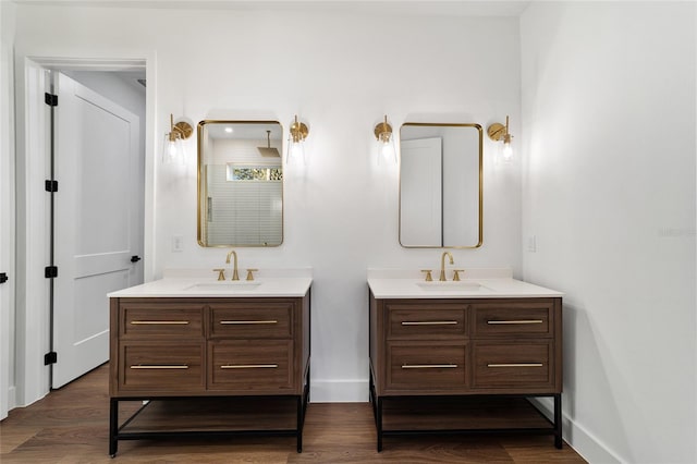 bathroom featuring hardwood / wood-style floors and vanity