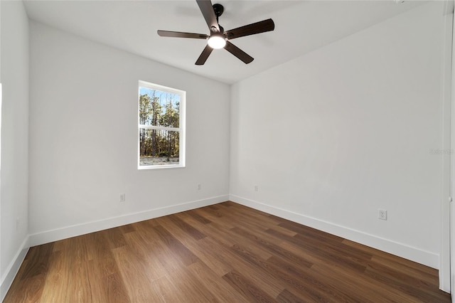 spare room with wood-type flooring and ceiling fan