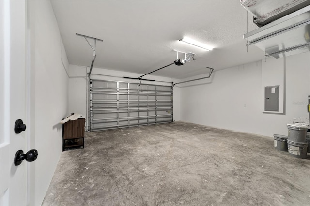 garage featuring a garage door opener and electric panel