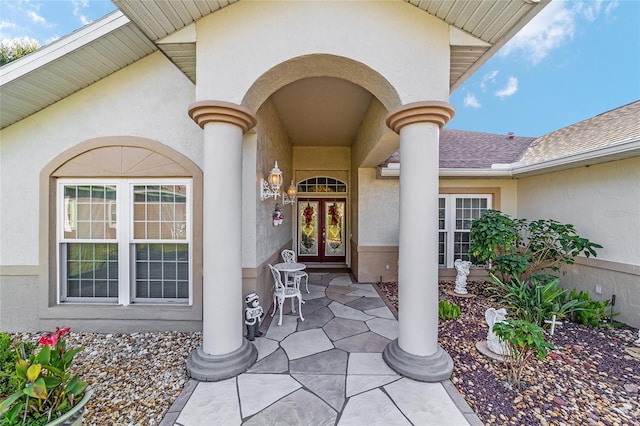 doorway to property featuring a patio area and french doors