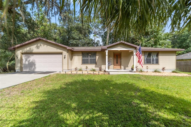 ranch-style house with a front yard and a garage