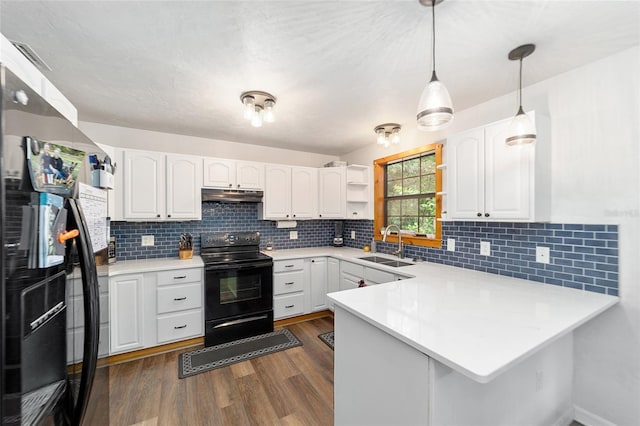 kitchen featuring white cabinets, electric range, kitchen peninsula, and fridge with ice dispenser