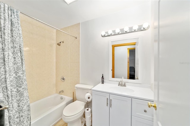 full bathroom with vanity, toilet, and shower / tub combo with curtain