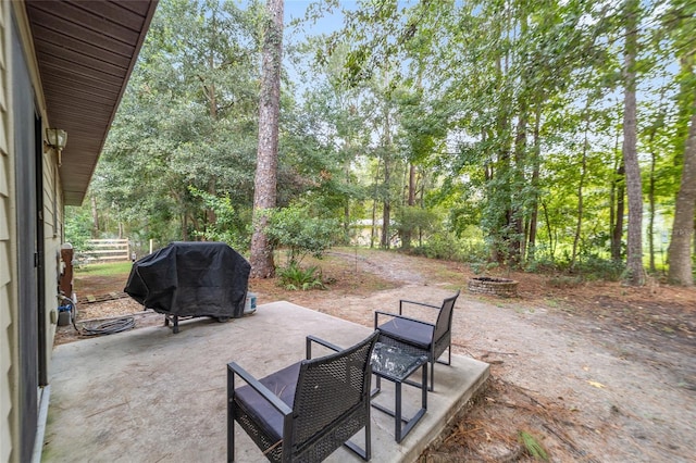 view of patio featuring a grill