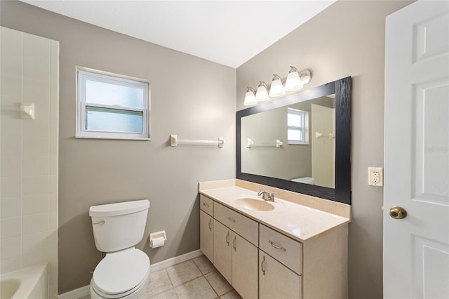 bathroom featuring tile patterned flooring, vanity, and toilet