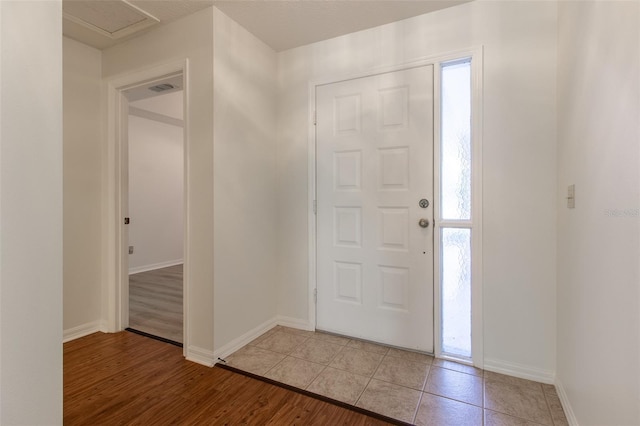 foyer entrance featuring light hardwood / wood-style flooring