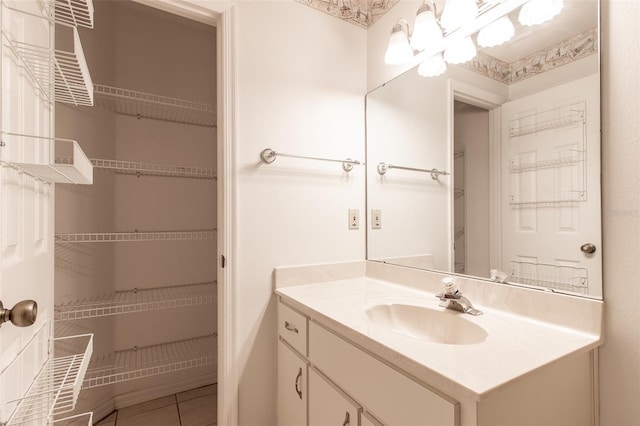 bathroom with vanity and tile patterned floors