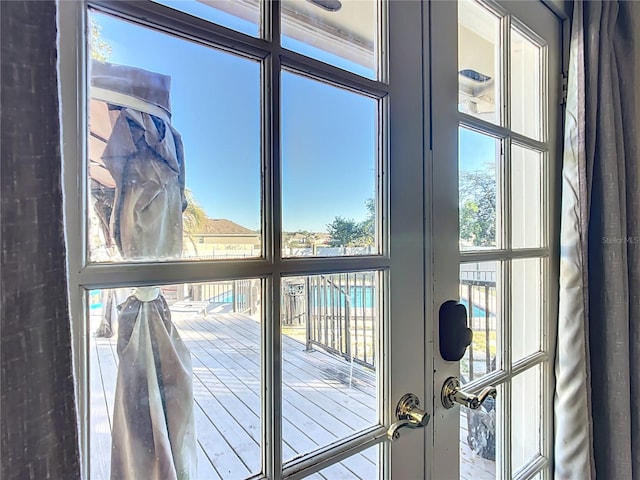 doorway to outside featuring a wealth of natural light