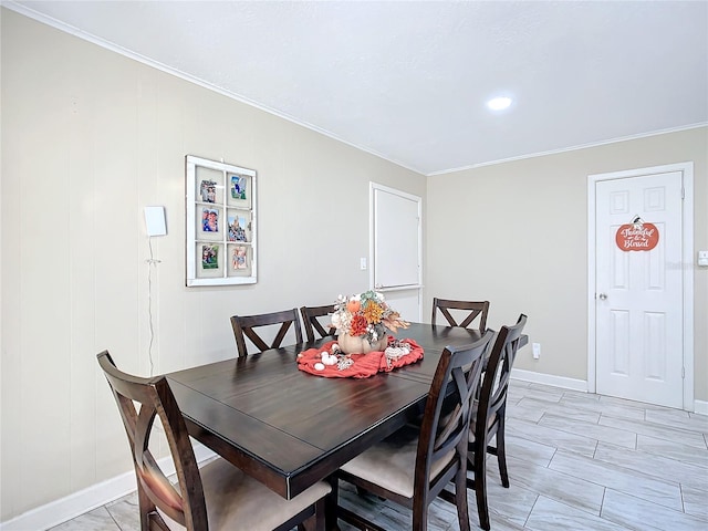 dining room with crown molding