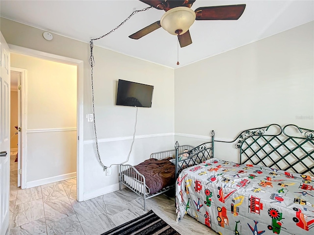 bedroom featuring ceiling fan