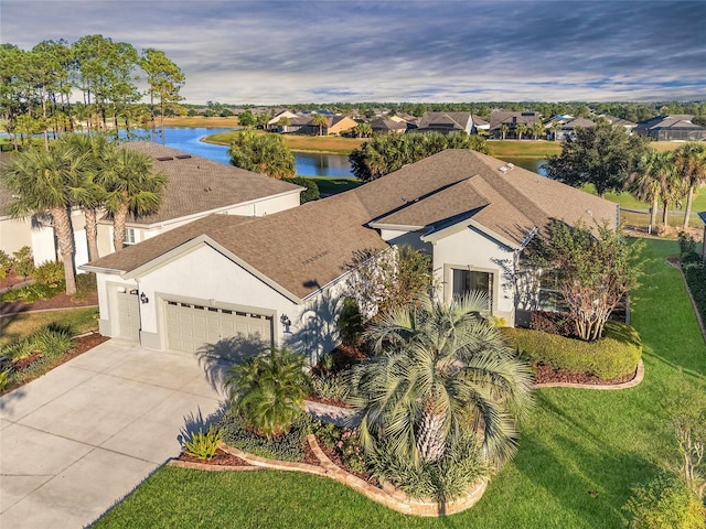 bird's eye view with a water view