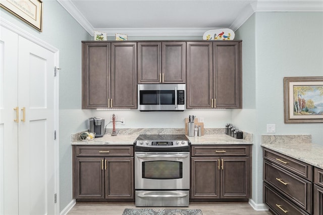 kitchen featuring light stone countertops, dark brown cabinetry, stainless steel appliances, crown molding, and light hardwood / wood-style floors