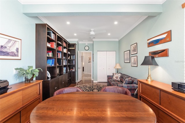 interior space with ceiling fan and crown molding