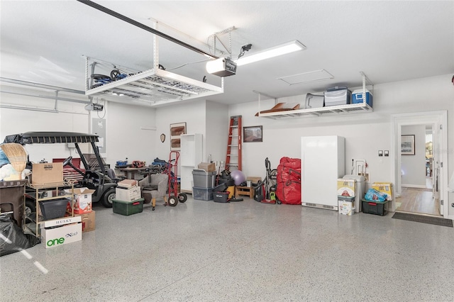 garage featuring a garage door opener