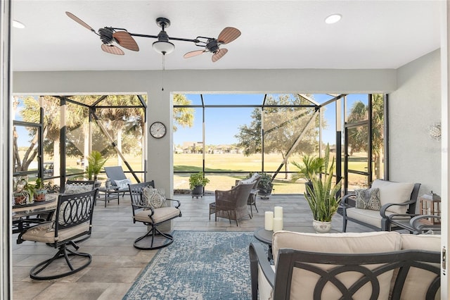 view of patio / terrace featuring a lanai and an outdoor living space