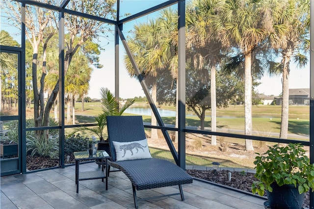 sunroom with a water view