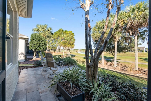 view of patio / terrace with a water view