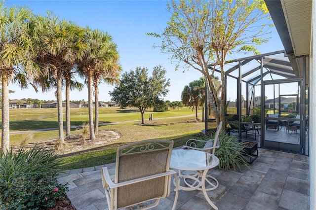 view of patio / terrace with a lanai