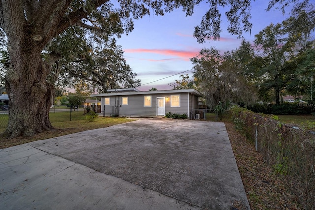 ranch-style house featuring a yard