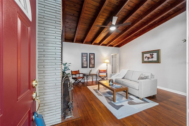 living room with dark hardwood / wood-style flooring, lofted ceiling with beams, ceiling fan, and wood ceiling