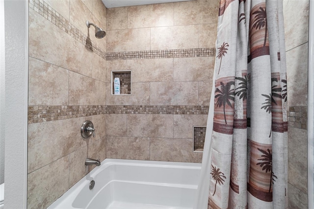 bathroom featuring shower / tub combo with curtain