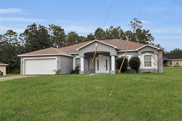 single story home with a front yard and a garage