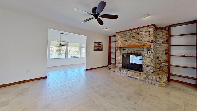 unfurnished living room with a fireplace, light tile patterned floors, and ceiling fan with notable chandelier