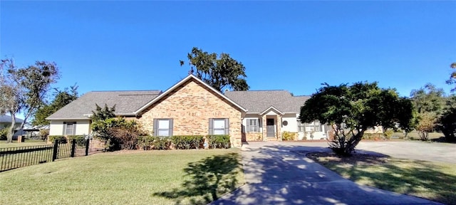 view of front of home with a front lawn