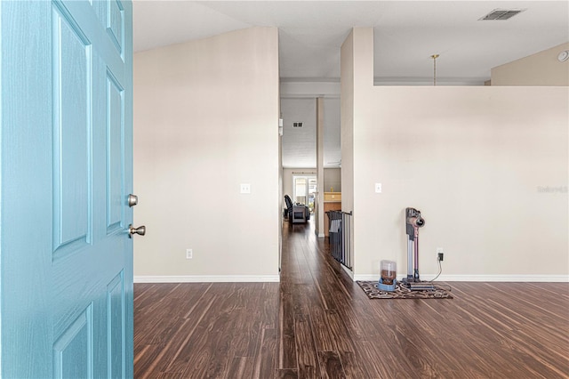 entrance foyer featuring dark hardwood / wood-style floors