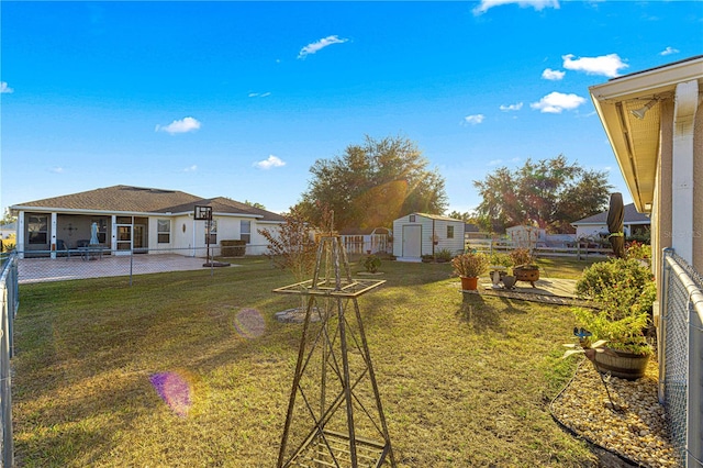 view of yard featuring a storage shed