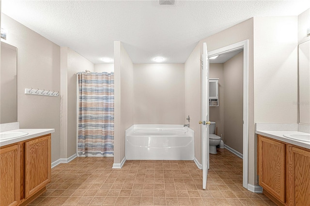 full bathroom featuring vanity, toilet, a textured ceiling, and plus walk in shower