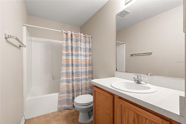 full bathroom with vanity, toilet, a textured ceiling, and shower / tub combo